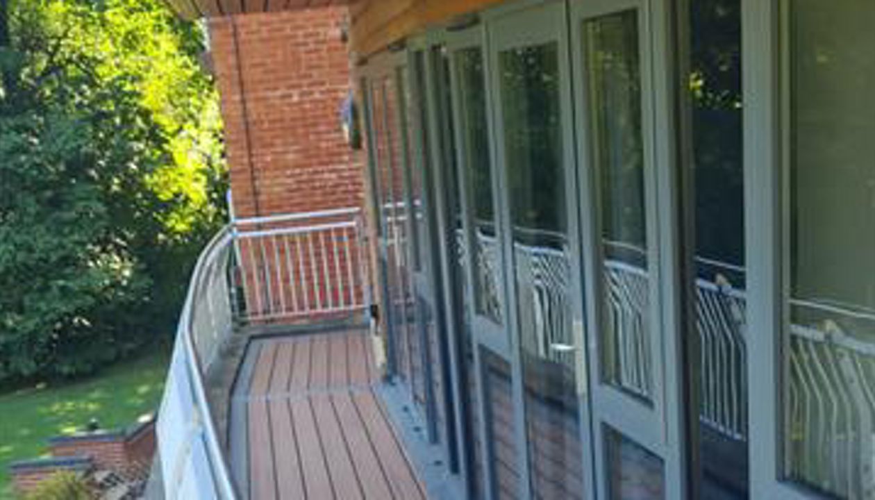 Balcony done in Trex Tiki Torch with Island Mist picture frame