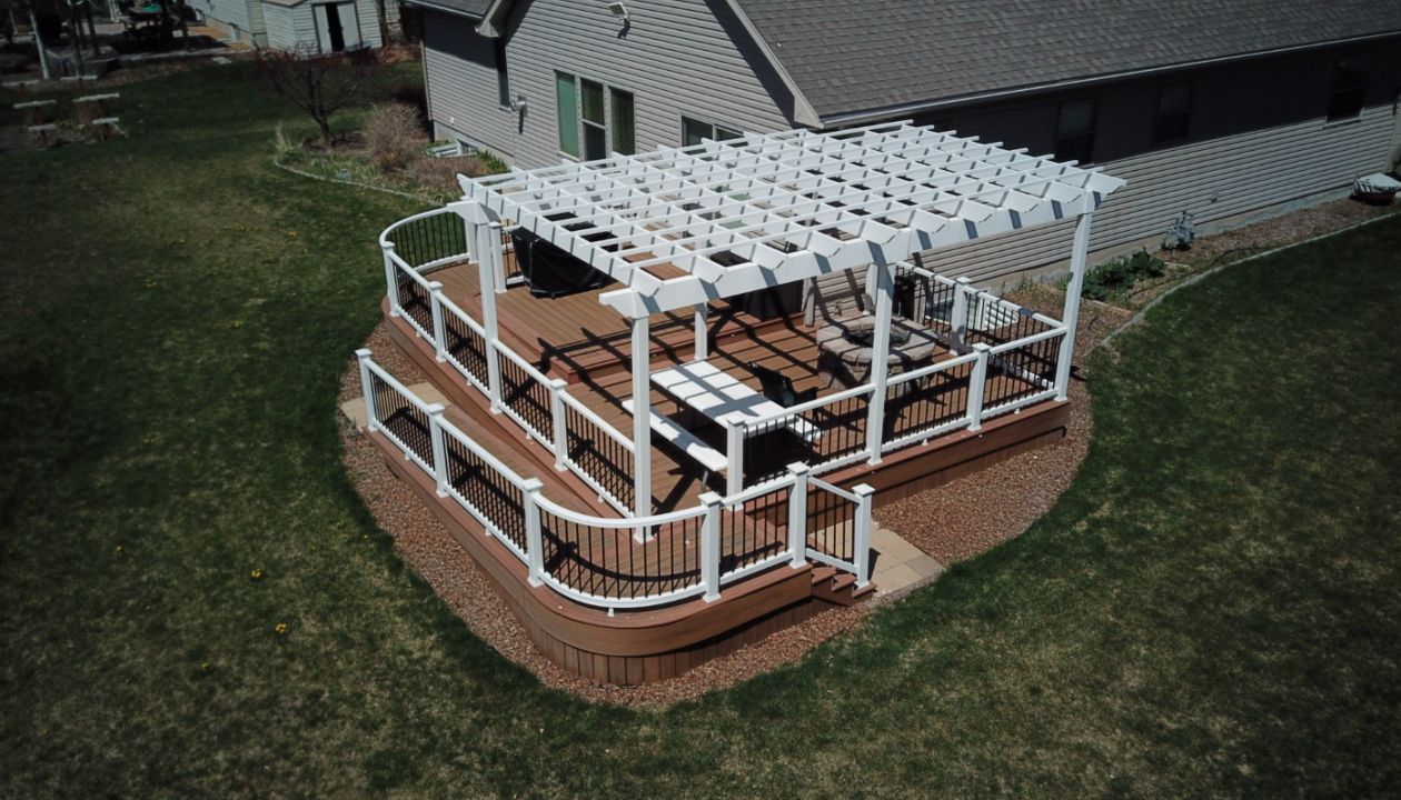 Rexburg, ID Trex Deck featuring Tiki Torch deck with Select railing and Trex Pergola