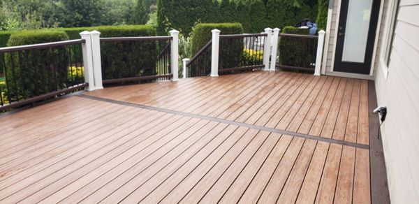 Tiki Torch with Lava Rock picture frame. Vintage Lantern rails and Trex lighting.