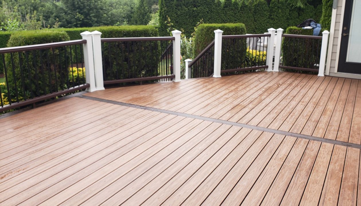 Tiki Torch with Lava Rock picture frame. Vintage Lantern rails and Trex lighting.