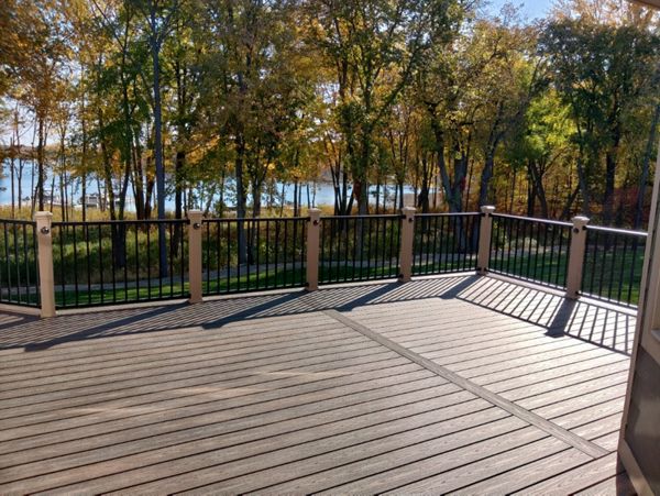Spiced rum decking Trex Signature railing in black