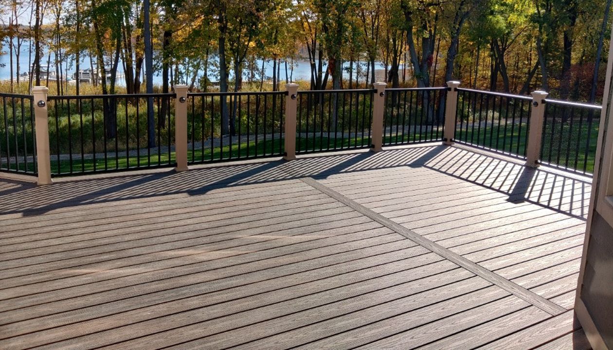 Spiced rum decking Trex Signature railing in black