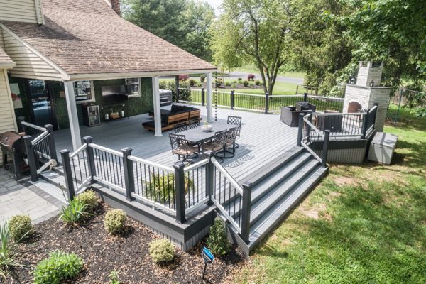 Trex Deck with Island Mist Decking & Trex Select Railing and Custom Fireplace
