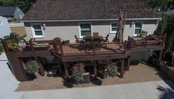 Trex Transcend Tree house deck with Vintage Lantern Railing, boarder, fascia, beam, and post wraps.