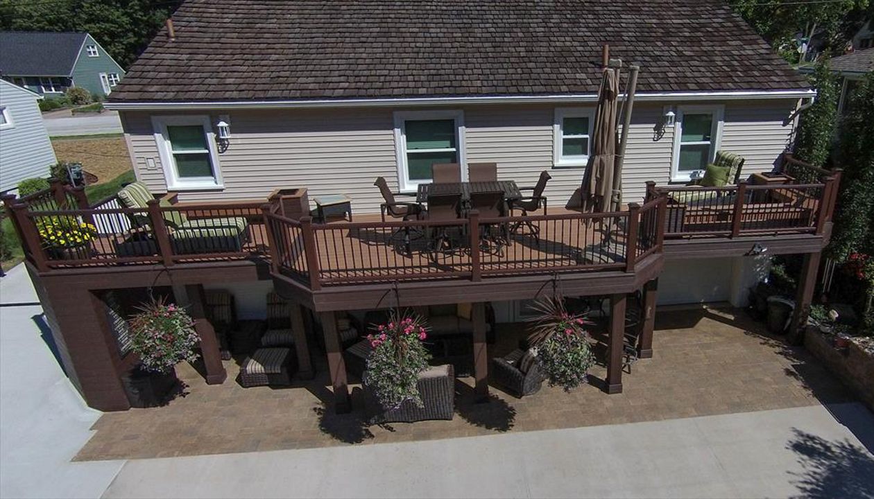 Trex Transcend Tree house deck with Vintage Lantern Railing, boarder, fascia, beam, and post wraps.