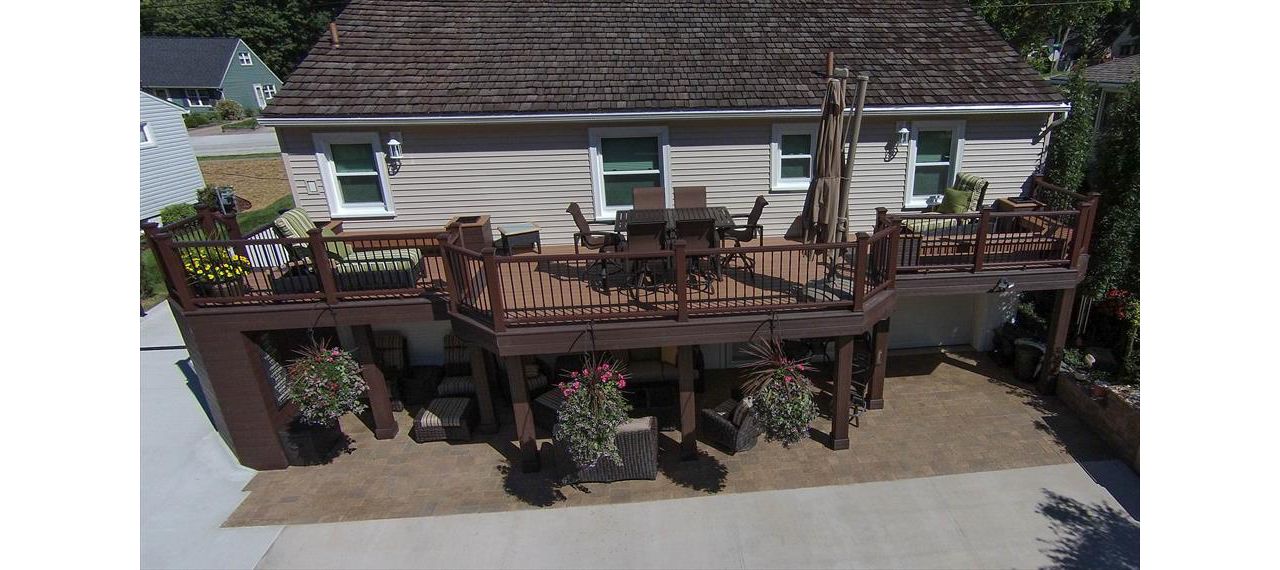 Trex Transcend Tree house deck with Vintage Lantern Railing, boarder, fascia, beam, and post wraps.
