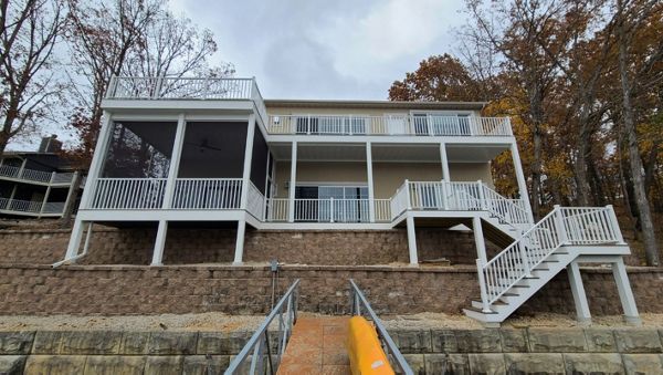 Large deck with screened in room with ceiling fan. Decking is Toasted Sand done in Lake Ozark, MO