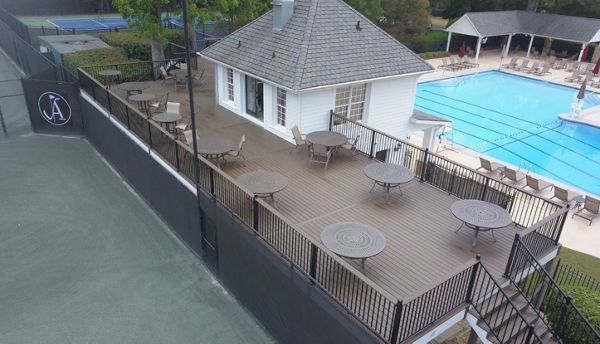 Atlanta Country Club over 1000sq ft of Spiced Rum with Signature Handrail with ADA stair handrail attachments.