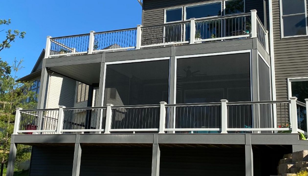 Trex Select Pebble Gray Decking, Select Railings, Rain Escapes Ceiling, Phantom Screens, 2 Level Deck, & A Bonus Storage Room Below