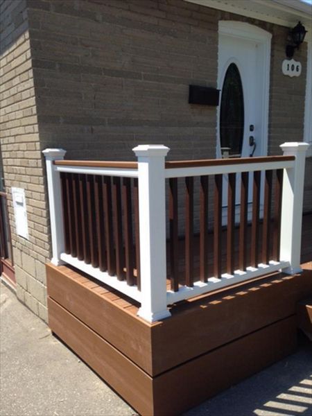 Trex Select Saddle custom made COMPOSITE porch with Trex Select Madeira railing and classic white posts. The Porch built in Toronto, Mississauga, Scarborough, Etobicoke, North York, Markham, RTrex
