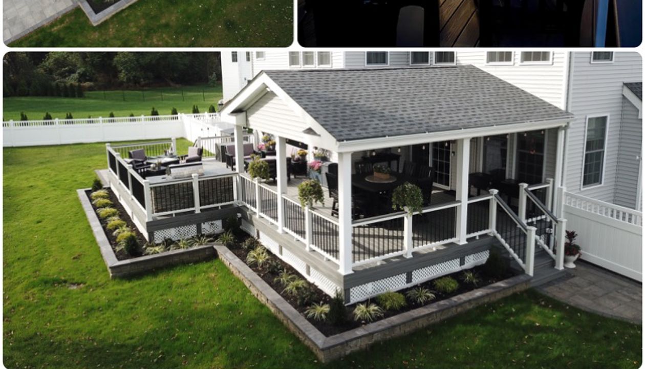 Trex Transcend Island Mist with a covered roof on part of the deck for a outdoor living area.