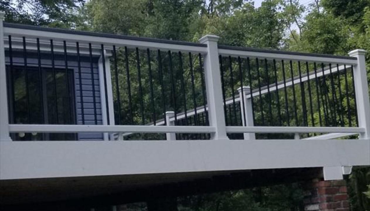 Elevated Deck with White Railing and Black Balusters