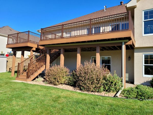 Transcend Tiki Torch, Bronze Signature Railings and Rain Escape, Rochester MN