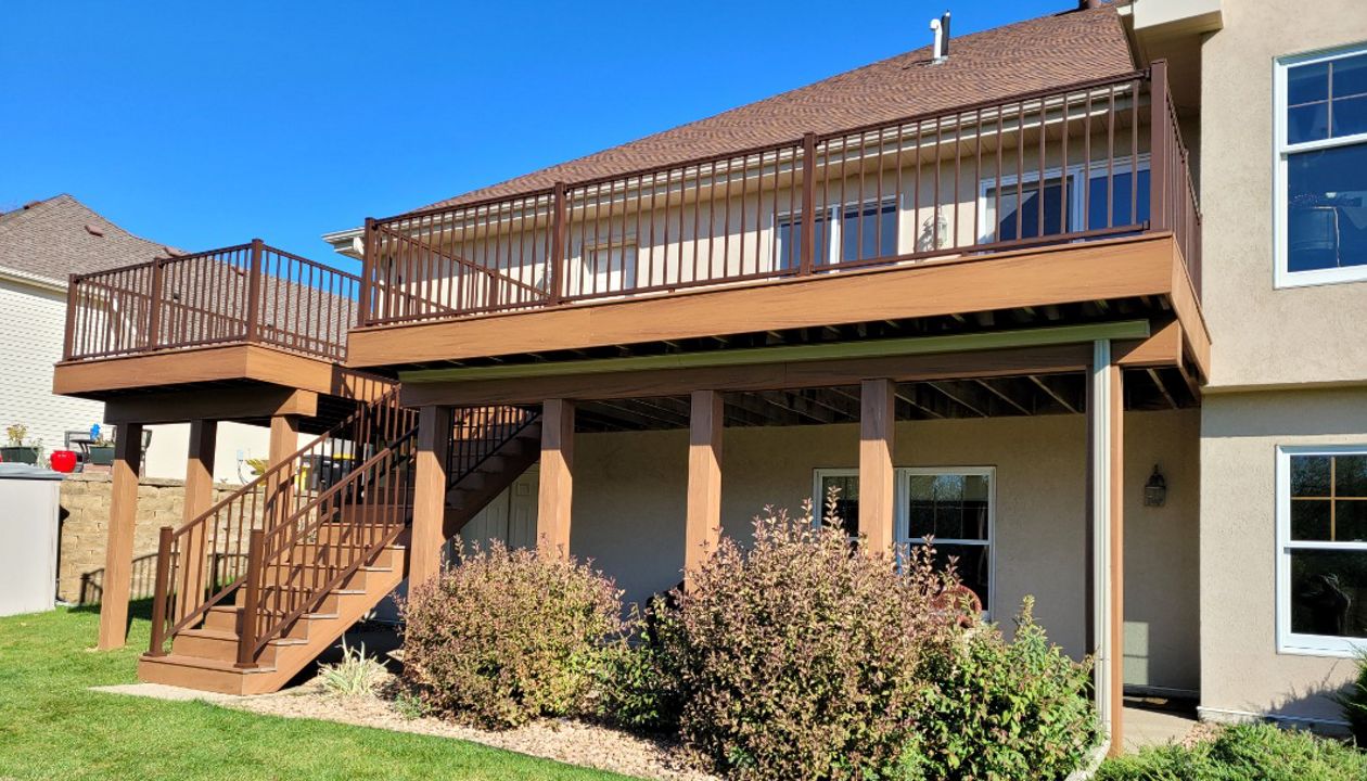 Transcend Tiki Torch, Bronze Signature Railings and Rain Escape, Rochester MN