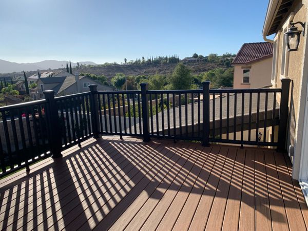 Transcend Tiki Torch decking and Charcoal Black railing