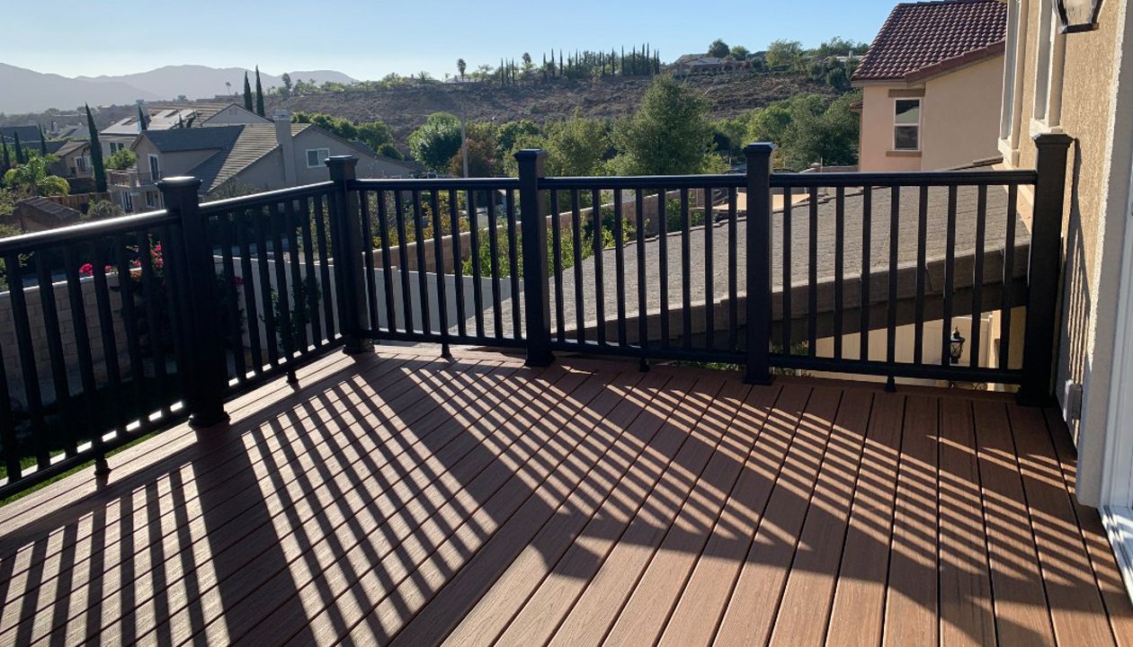 Transcend Tiki Torch decking and Charcoal Black railing