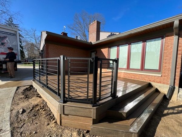 Toasted Sand with a Coastal Bluff Border and Black Signature railing