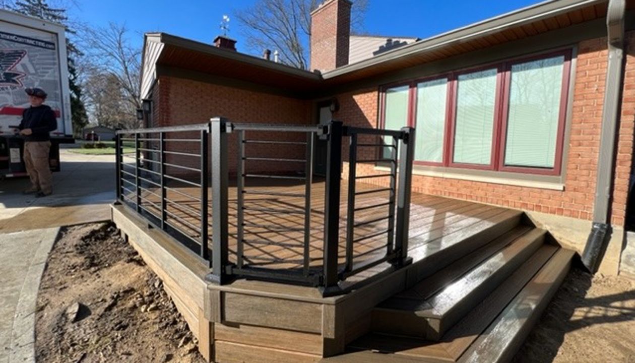 Toasted Sand with a Coastal Bluff Border and Black Signature railing