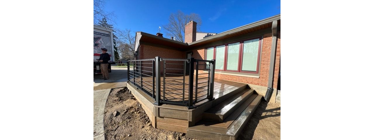 Toasted Sand with a Coastal Bluff Border and Black Signature railing