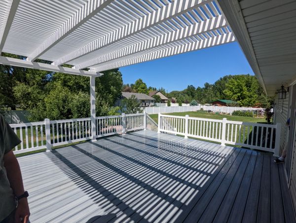 foggy wharf decking and skirting, white vinyl railing and pergola