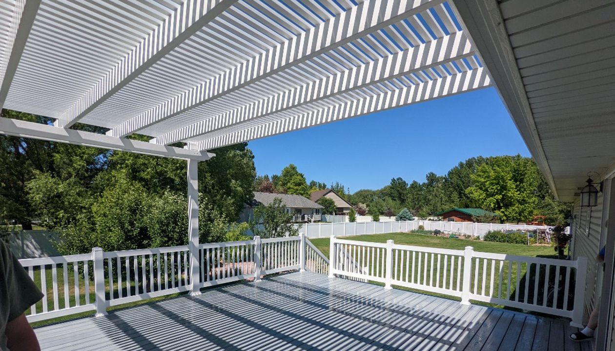 foggy wharf decking and skirting, white vinyl railing and pergola