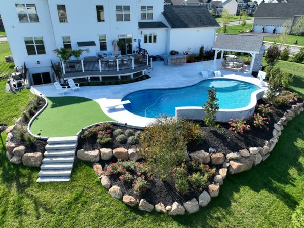 Trex Deck with Island Mist Decking, Trex Transcend Railing, and Custom Backyard