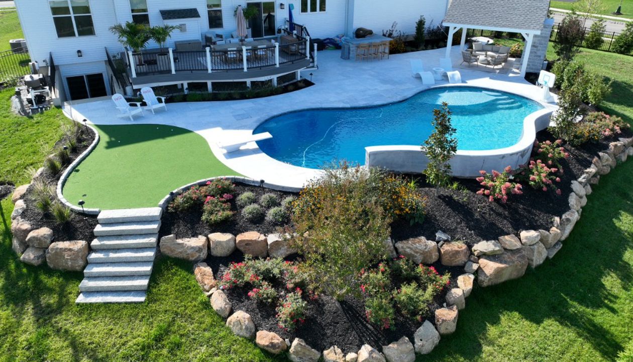 Trex Deck with Island Mist Decking, Trex Transcend Railing, and Custom Backyard