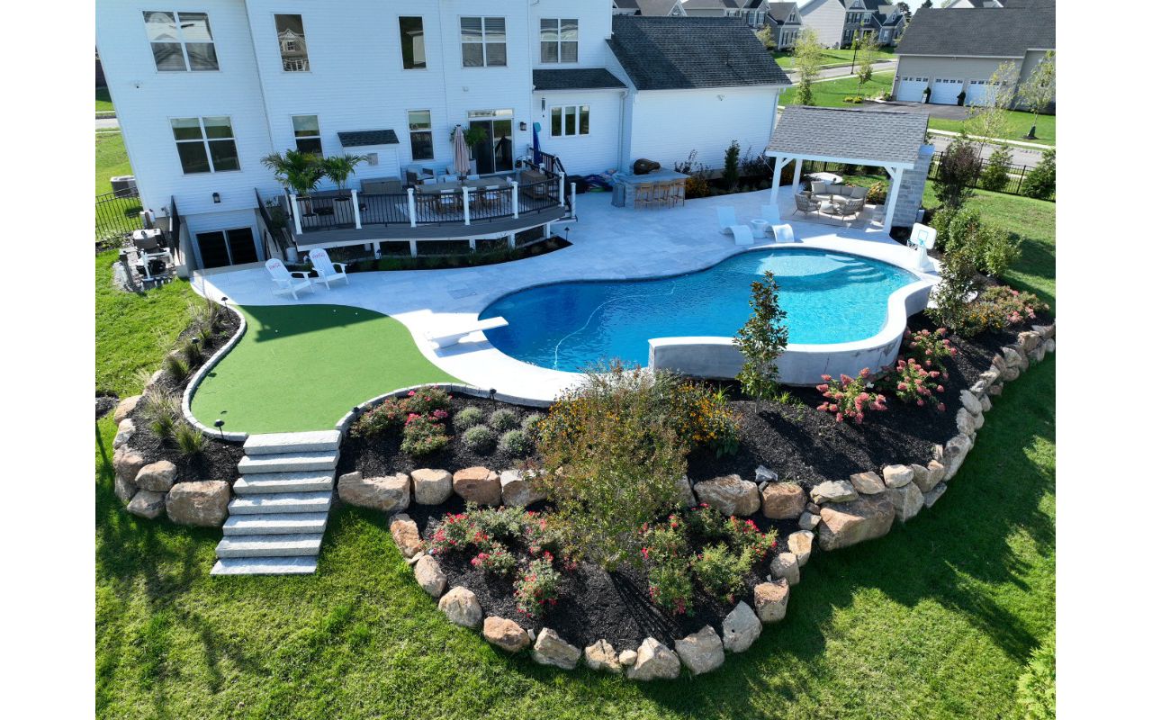 Trex Deck with Island Mist Decking, Trex Transcend Railing, and Custom Backyard