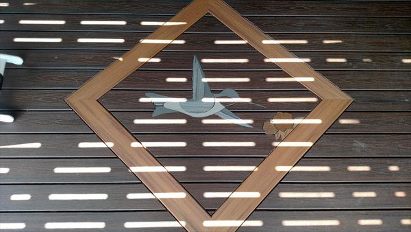 Custom Hummingbird Inlay at the Andes, NY deck