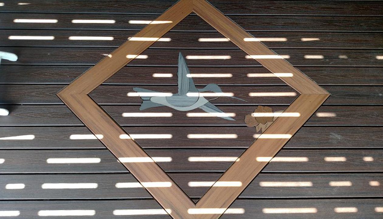 Custom Hummingbird Inlay at the Andes, NY deck
