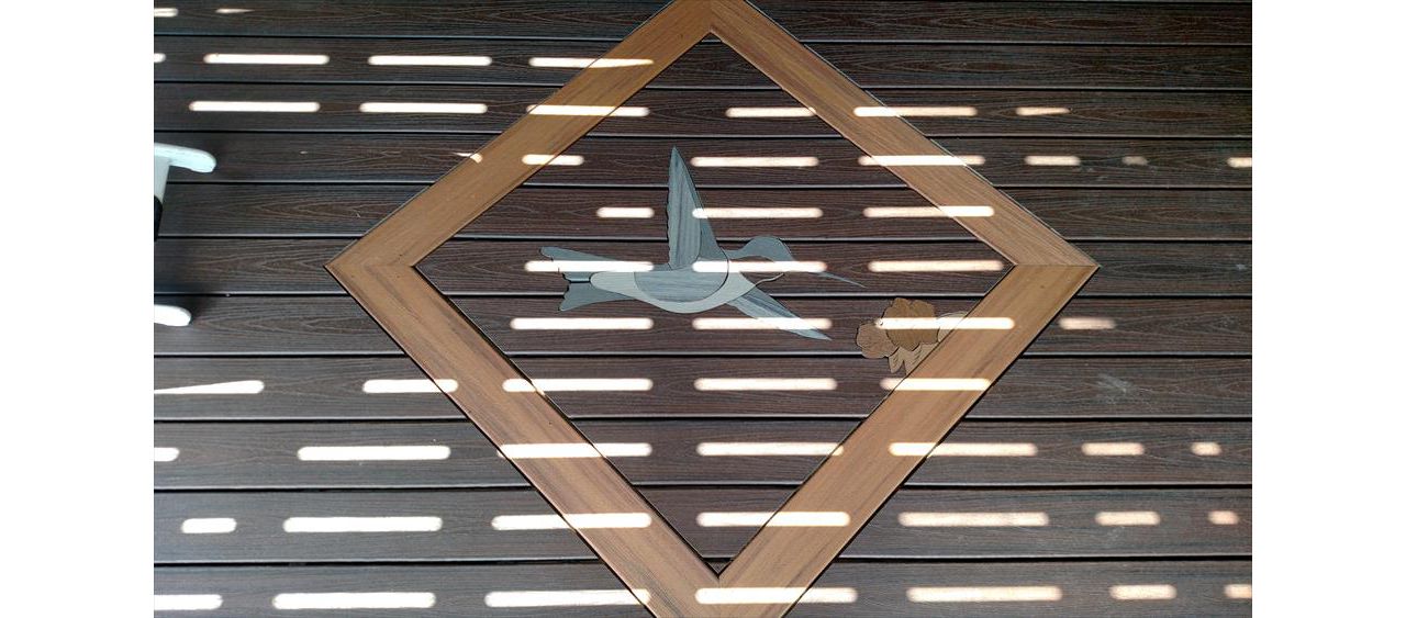 Custom Hummingbird Inlay at the Andes, NY deck