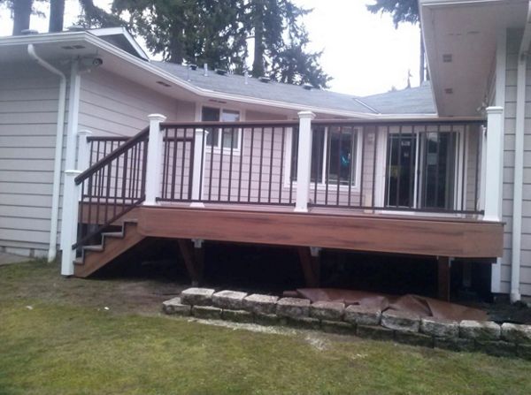 Trex Tiki Torch deck with Trex Signature bronze drink rail