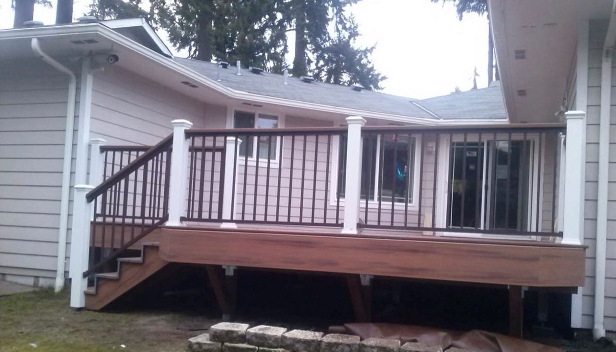 Trex Tiki Torch deck with Trex Signature bronze drink rail