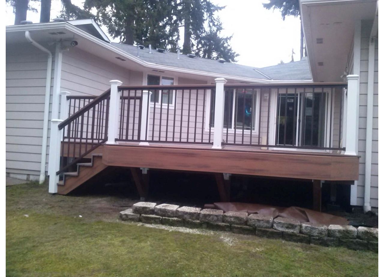 Trex Tiki Torch deck with Trex Signature bronze drink rail