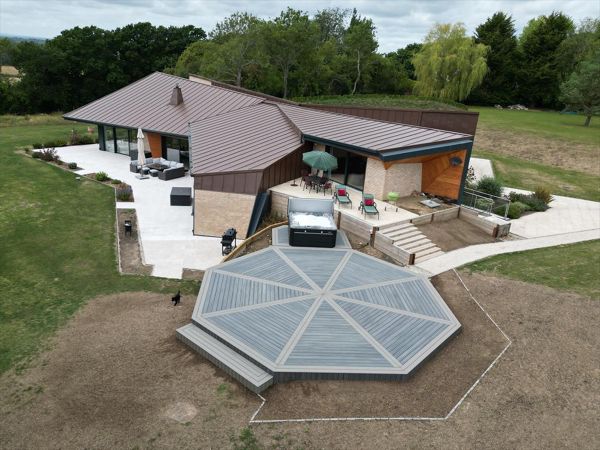 Trex Transcend Island Mist Octagon Decking, Double Picture Framed with Sixteen Gravel Path Boards meeting in the centre to become one.