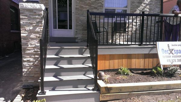 Trex Transcend Gravel Path custom made COMPOSITE porch with black aluminum railing and solid skirting.The Porch built in Toronto, Mississauga, Scarborough, Etobicoke, North York, Markham, Richmond Hill, Thornhill, Vaughan