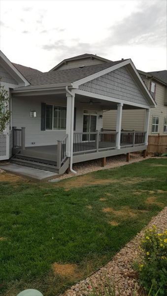 Beautiful Transcend Deck, Railing and Covered Patio with Recessed Lighting and Ceiling Fan in Terrain, Castle Rock