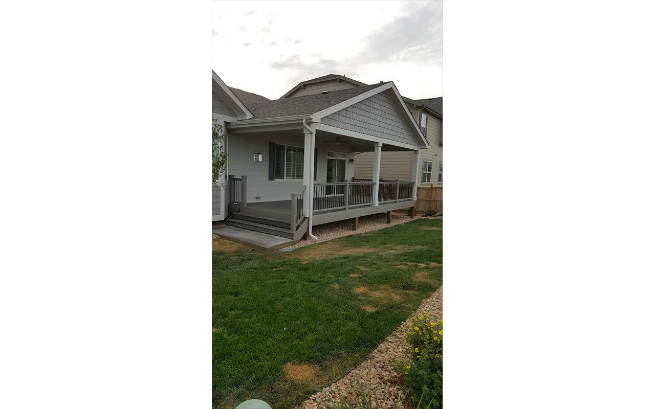 Beautiful Transcend Deck, Railing and Covered Patio with Recessed Lighting and Ceiling Fan in Terrain, Castle Rock