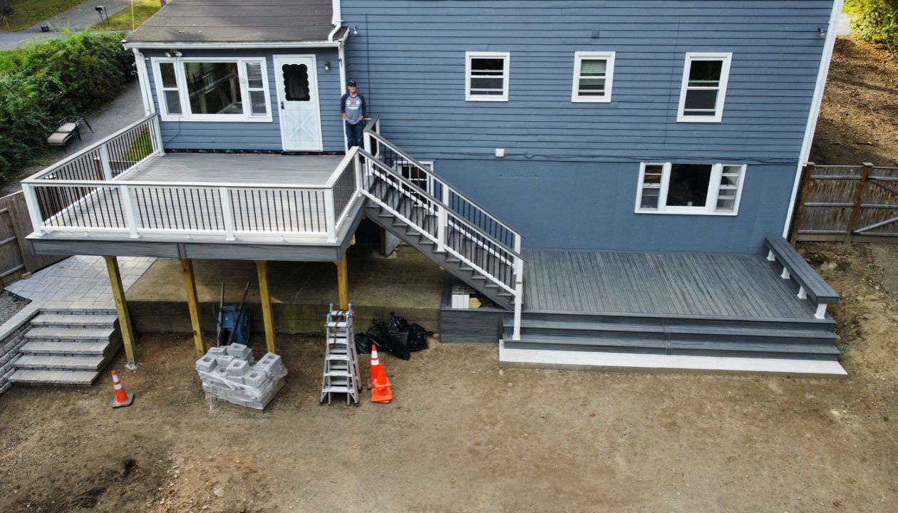 Beautiful 2-Tier Outdoor Living Space, Trex Transcend Island Mist and Trex Transcend Railings With Cocktail Rails, in Ipswich, MA