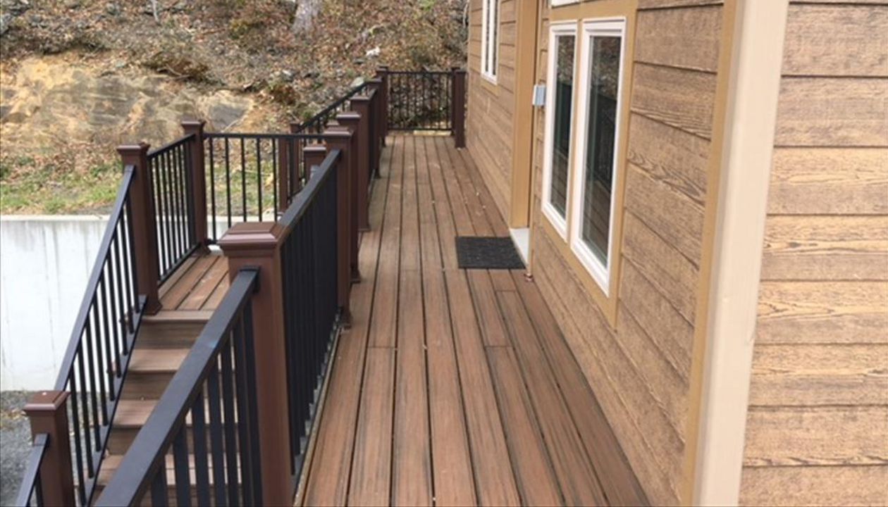 Trex Transcend decking & Signature railing walkway resists weather in the elevated mountain environment.