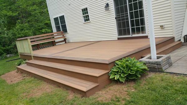 Ground Decks using Composite Decking in Meriden CT. Ground decks can be hardwoods decks like Ipe go great with Trex Railings and Trex outdoor storage.  Pressure Treated decks too