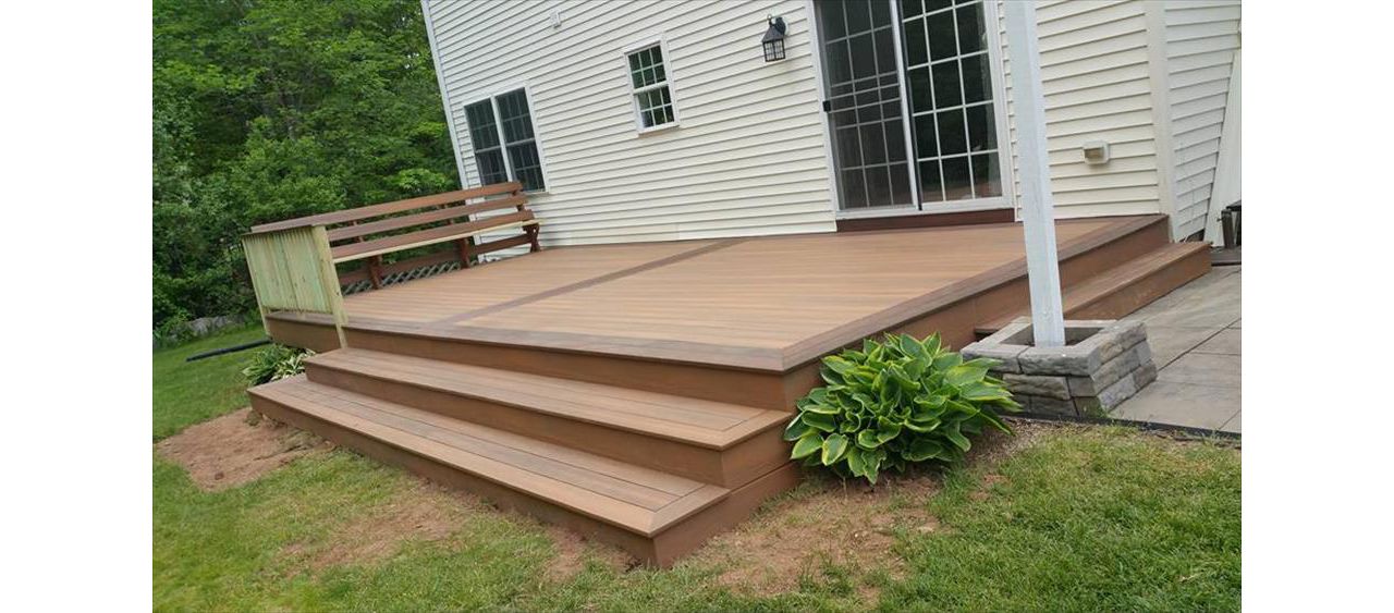 Ground Decks using Composite Decking in Meriden CT. Ground decks can be hardwoods decks like Ipe go great with Trex Railings and Trex outdoor storage.  Pressure Treated decks too