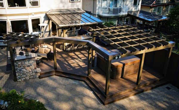 Spiced Rum decking & fascia, lighting package, and beautiful fir pergola system to compliment this amazing outdoor space complete with outdoor kitchen and gas fireplace.