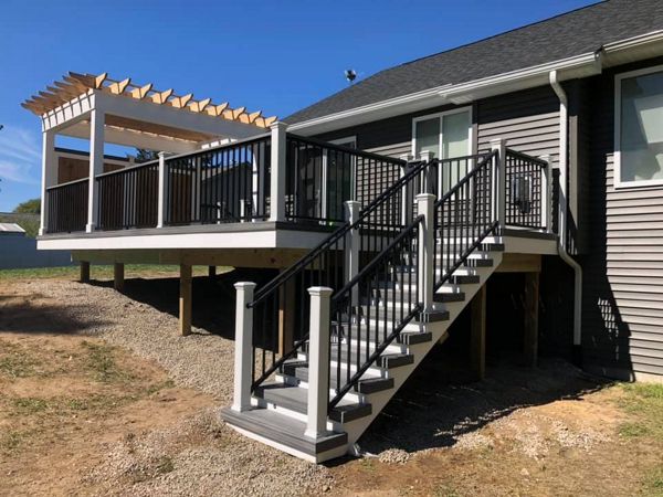 Trex Island Mist deck with black signature rail and Custom build pergola