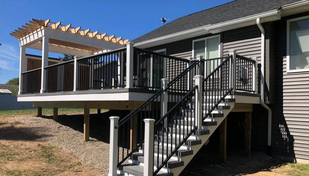 Trex Island Mist deck with black signature rail and Custom build pergola