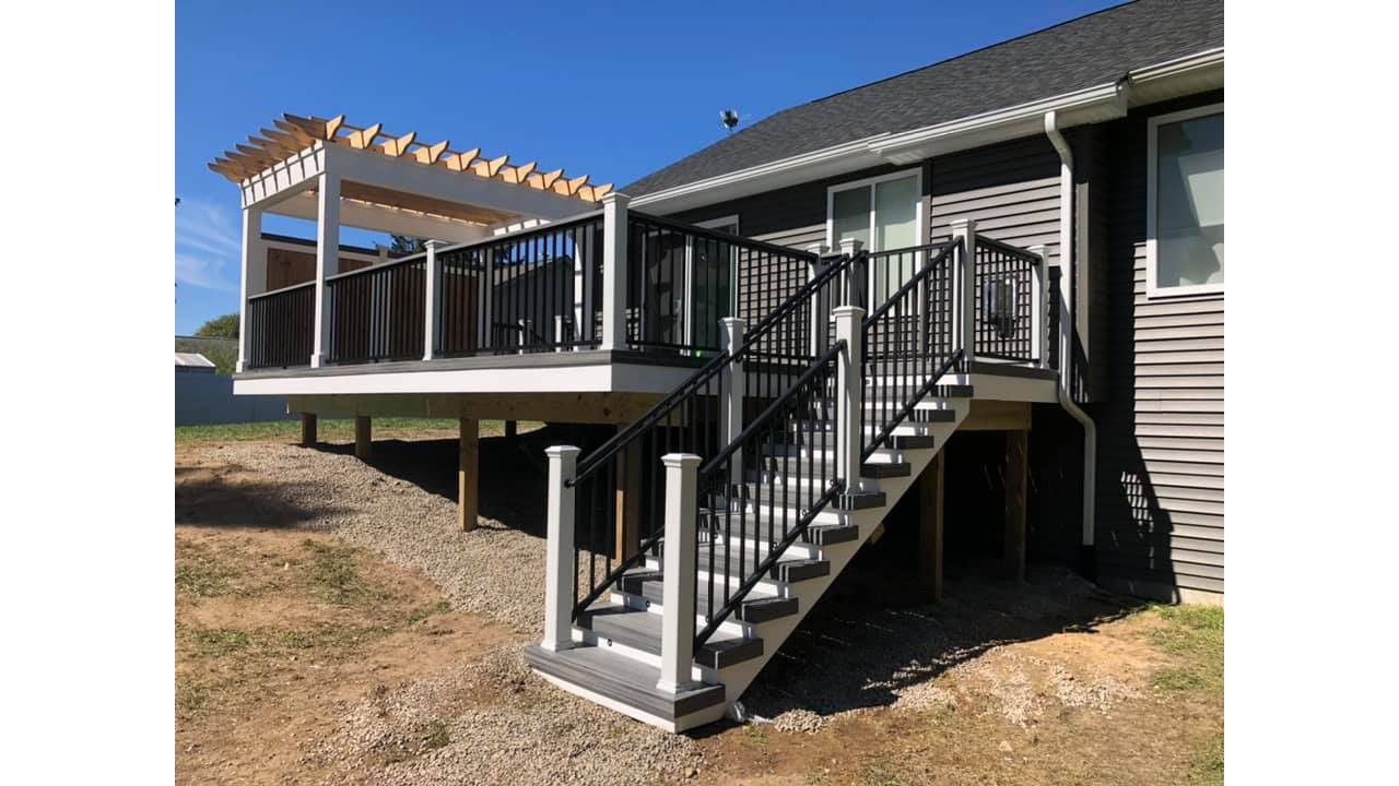 Trex Island Mist deck with black signature rail and Custom build pergola