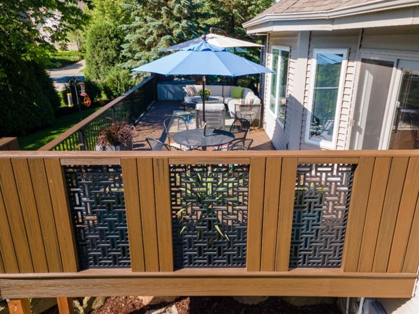 Using Trex Transcend decking and Acurio Lattice, we created a custom privacy wall that adds unique beauty to the space.