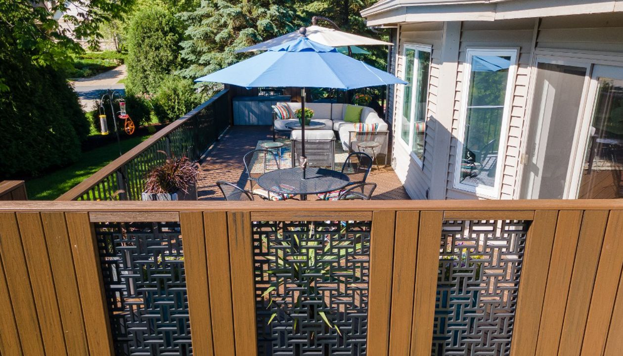 Using Trex Transcend decking and Acurio Lattice, we created a custom privacy wall that adds unique beauty to the space.