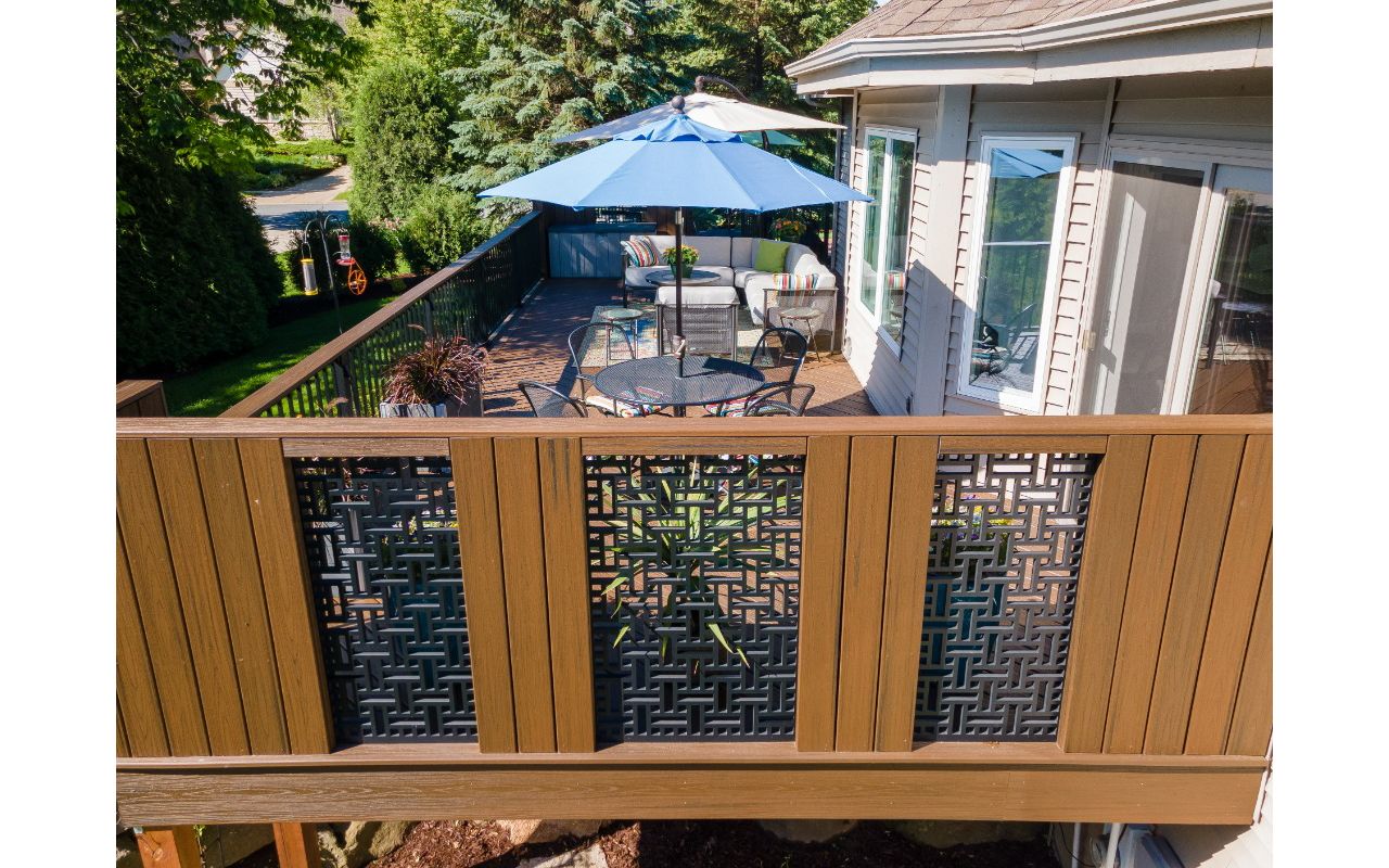 Using Trex Transcend decking and Acurio Lattice, we created a custom privacy wall that adds unique beauty to the space.