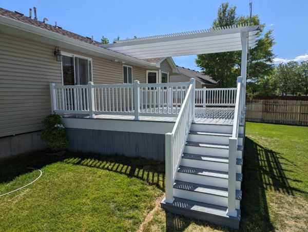 foggy wharf decking and skirting, white vinyl railing and pergola